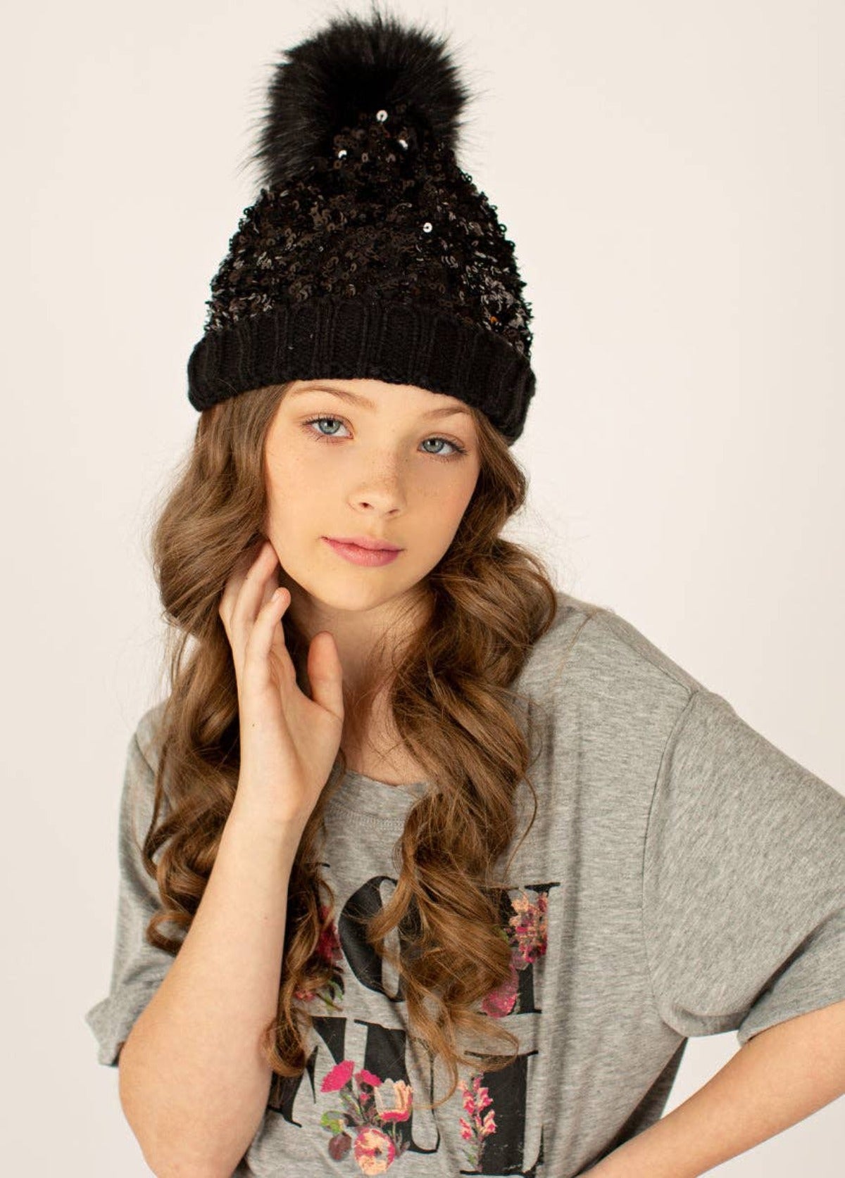 Ladies black pom pom hot sale hat